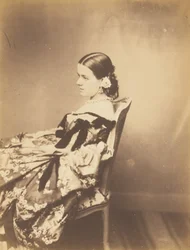 Retrato de una mujer sentada de perfil