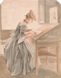 Una señora copia en una mesa de dibujo