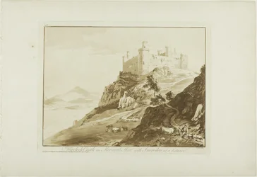Castillo de Harlech en Merioneth Shire con Snowdon a lo lejos