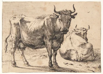 Vaca de pie y tumbada
