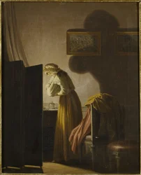 Una mujer atrapando pulgas a la luz de la vela