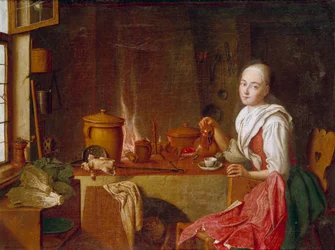 Dama en su cocina. Una joven sentada en un café frente a la chimenea