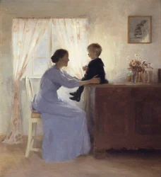 Una madre y un niño en un interior