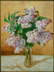 Ramo de lilas en un jarrón de vidrio