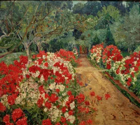 Camino del jardín con parterre de flox