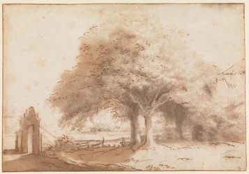 Árboles altos delante de una granja