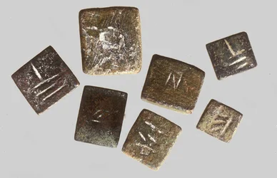 Pesas inscritas con su peso individual