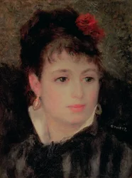 Mujer con una rosa en el cabello