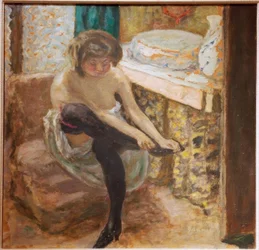 La mujer con medias negras