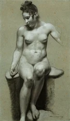 Una mujer desnuda sentada
