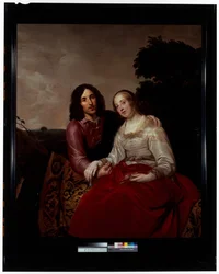 Retrato de matrimonio de una pareja joven en un paisaje