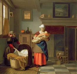 Niñera con bebé en un interior y una niña preparando la cuna