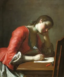 Jovencita escribiendo una carta de amor