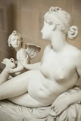 Venus con Cupido quitándole una espina del pie