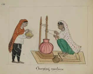 Dos mujeres con una máquina de batir