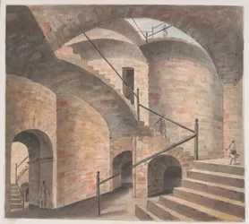 Interior del depósito de opio de Patna, con una escalera que se eleva sobre arcos cada vez más altos.