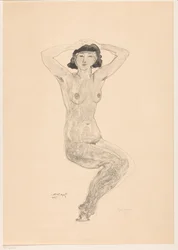 Mujer desnuda sentada con las manos en la cabeza