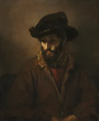 Un Hombre con Barba Usando un Sombrero