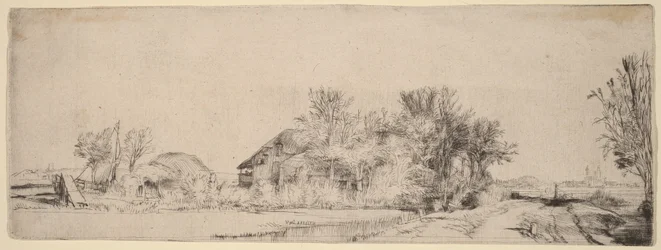 Paisaje con un camino junto a un canal