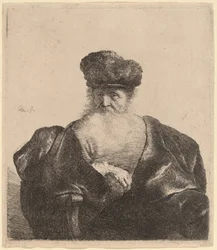 Viejo con barba, gorro de piel y capa de terciopelo