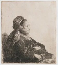 La madre de Rembrandt sentada
La madre del artista sentada, con un tocado oriental: de medio cuerpo