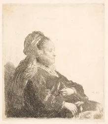 La madre de Rembrandt sentada mirando a la derecha, con un tocado oriental: medio cuerpo, mostrando las manos