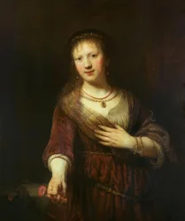 Saskia con la flor roja