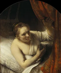 Joven mujer en la cama