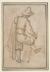 Hombre de pie, visto desde atrás