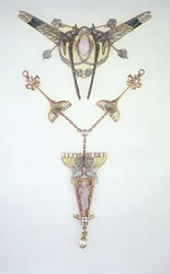 Adorno para el cabello de Lalique y colgante de Philippe Wolfers
