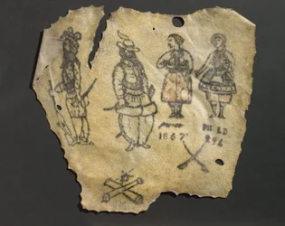 Piel humana tatuada con figuras, probablemente francesa
