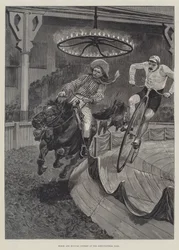 Concurso de caballo y bicicleta en el Agricultural Hall