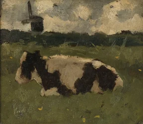 Vaca descansando con un molino