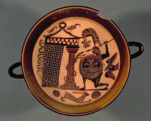 Copa de figuras negras laconias que representa a un guerrero atacando a una serpiente, siglo VI a.C.