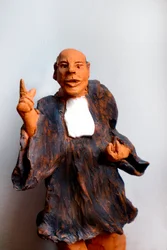 Abogado vestido, alegando, siglo XX (escultura)
