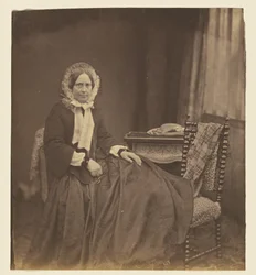 [Retrato de una mujer sentada, con cofia]