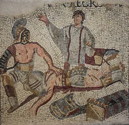 Una lucha de gladiadores con el árbitro