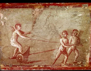 Cupidos jugando con un carro (fresco)