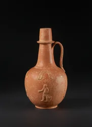 Jarra con decoración aplicada de hombre, pájaro, palmas y guirnaldas, Norte de África