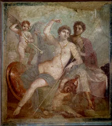 Representación de Ares y Afrodita, acompañados de amorcillos que juegan con las armas del dios. Fresco de la Villa de Marte y Venus en Pompeya. Siglo I d.C. Museo Arqueológico de Nápoles - Arte romano: Ares, Afrodita y Eros. Afrodita (Venus), reclinada