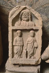 Estela votiva dedicada a Saturno, Alto Período Imperial