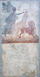 Un asno penetrando a un león es coronado por la diosa Victoria, debajo un graffito con combate de gladiadores, insigna de una tienda