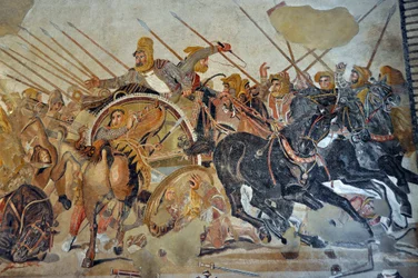 Detalle de un mosaico de Pompeya: batalla de Issos entre Alejandro y Darío (siglo IV a. C.). El rey Darío III Codomano (380-330 a. C.), desesperado en su carro. Opus vermiculatum. Museo Arqueológico Nacional de Nápoles, Italia.