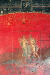 Fresco cerca de la Casa de Vettii que representa a dos personajes mitológicos, Pompeya (Patrimonio Mundial de la UNESCO