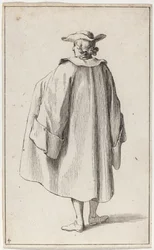Hombre de pie visto desde atrás