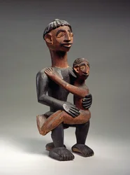 Madre sentada con niño, Igbo, Nigeria (madera)