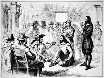 Massasoit, jefe del pueblo Wampanoag, extiende la pipa de la paz a John Carver en 1621