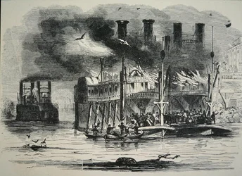 Barcos de vapor en el Mississippi en llamas en St. Louis
