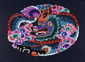 Recorte de papel chino y coloreado con un dragón