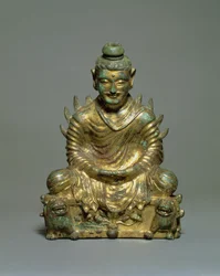 Buda sentado con hombros flamígeros, Período de las Seis Dinastías Chinas, dinastía Wei del Norte, siglo III-V (bronce dorado)